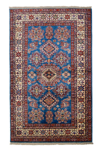 A hand-knotted Afghan Super Kazak woolen rug with a floral and geometric pattern in blue, red, and beige colors.