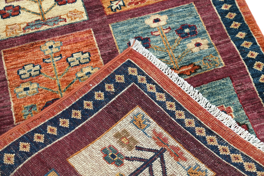 Khorjin Afghan Rug – Magenta Meadows