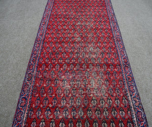 Hand knotted Shiraz Persian runner rug with traditional tribal motifs