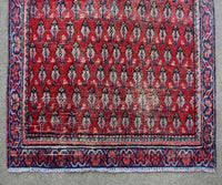Hand knotted wool Shiraz runner rug fringe and edge detail