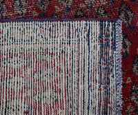 Back side of hand knotted Persian Shiraz runner showing wool weave
