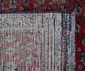 Back side of hand knotted Persian Shiraz runner showing wool weave