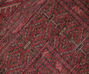 Backside of hand knotted vintage Turkmen Persian rug showing dense weave and authentic wool foundation
