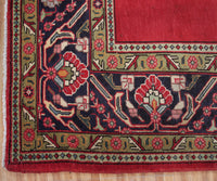 Detailed border view of vintage Tabriz rug featuring classic floral guard stripes and geometric accents
