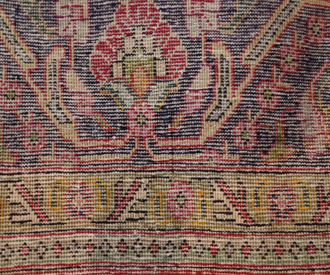 Backside of hand knotted vintage Tabriz Persian rug showing fine weave and traditional construction
