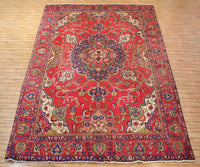Large vintage Tabriz Persian rug 285x385 cm full view showing intricate floral design and detailed corner spandrels
