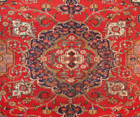 Close-up of Tabriz Persian rug central medallion with refined floral detailing and symmetrical layout

