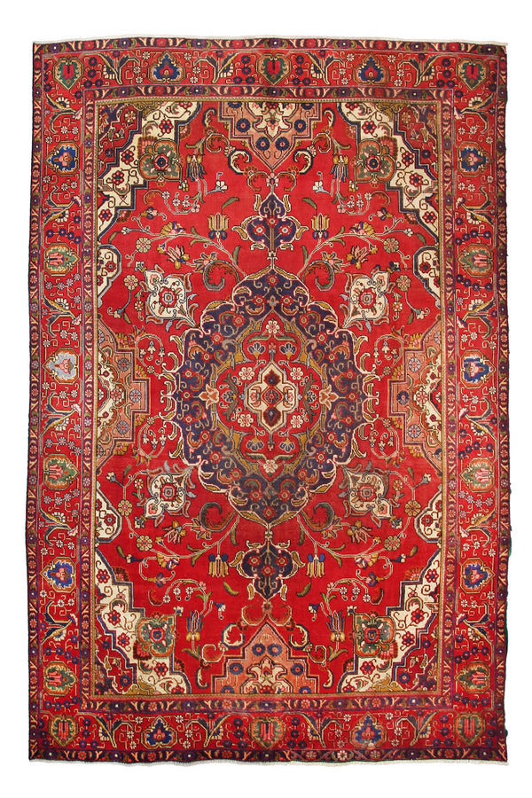 Hand knotted vintage Tabriz Persian rug 285x385 cm with ornate central medallion on vibrant red field
