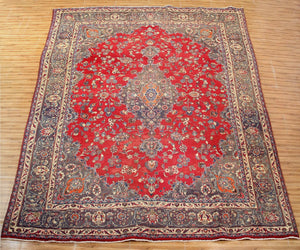 Large vintage Mashad Persian rug 297x390 cm full view showing intricate floral pattern and decorative borders
