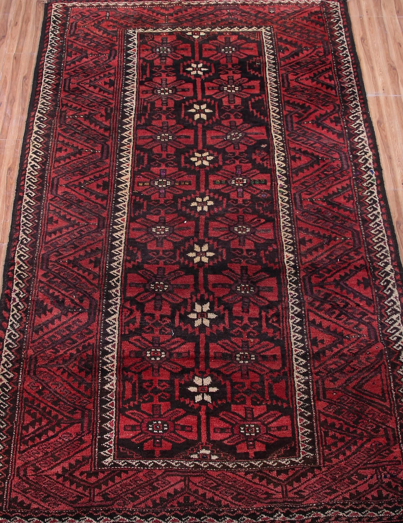 Vintage Baluchi Persian Rug – Crimson Patina