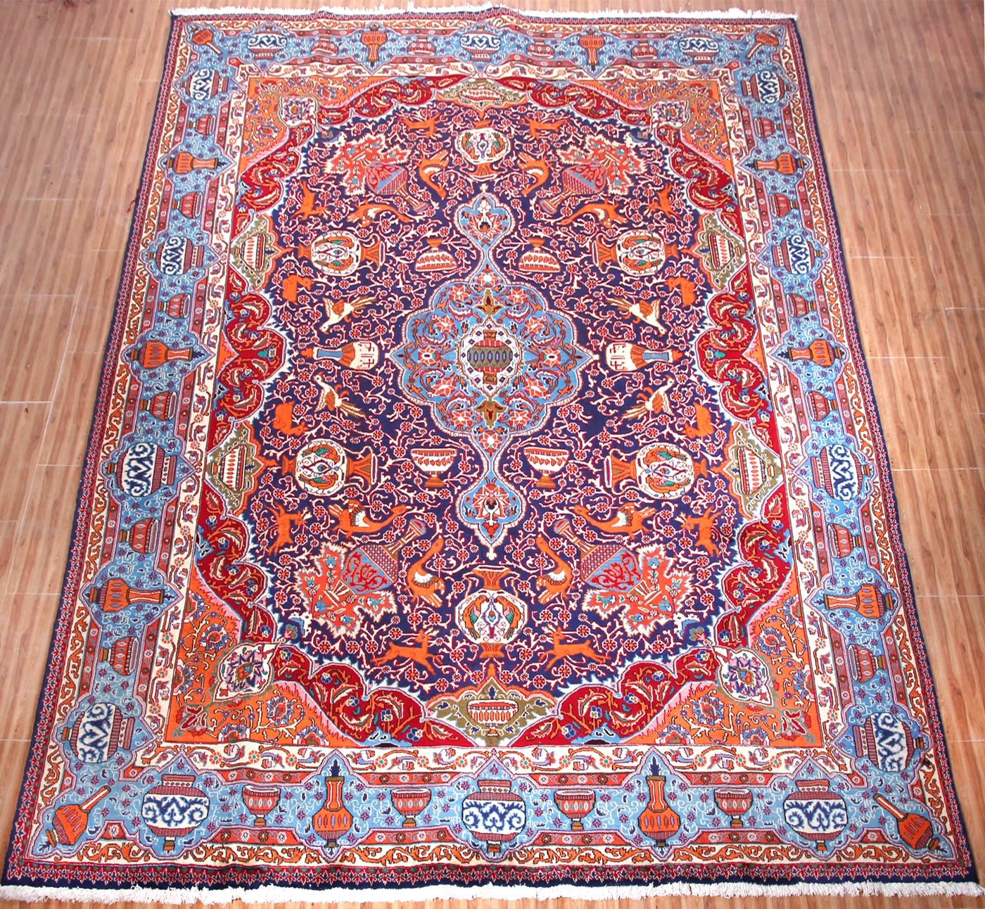 Hand knotted Kashmar Persian rug shown in room, large vintage wool rug