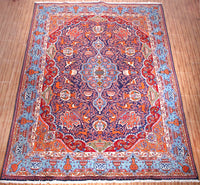 Hand knotted Kashmar Persian rug shown in room, large vintage wool rug