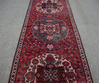 Hand knotted Shiraz runner rug with central medallion design