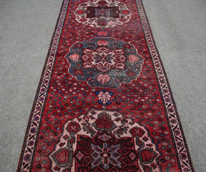 Hand knotted Shiraz runner rug with central medallion design