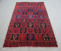 Vintage Persian Shiraz rug 145x233 cm with geometric tribal motifs in red tones