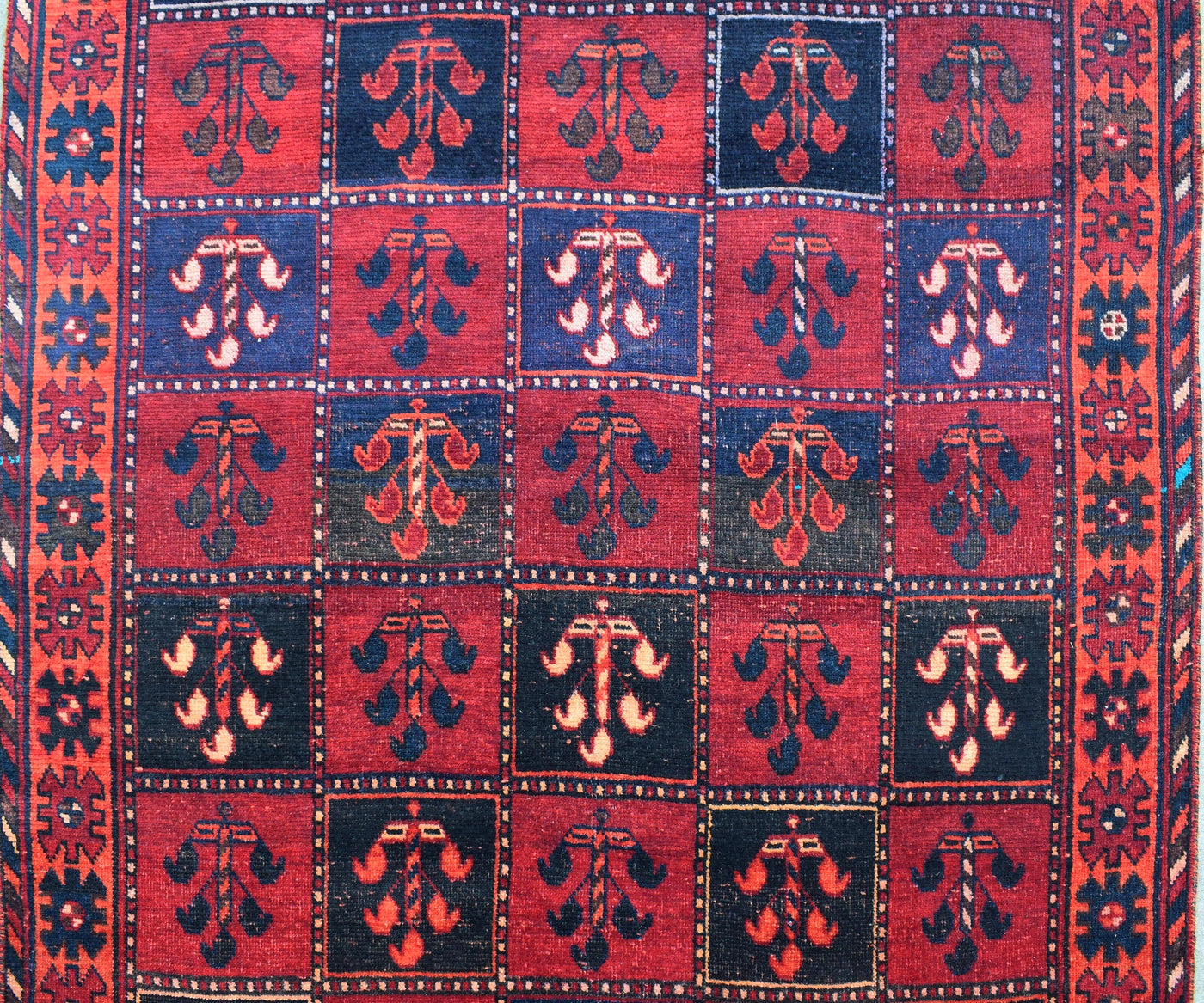 Close-up of vintage Persian Shiraz rug with detailed geometric pattern