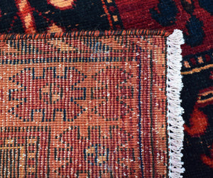 Backside of hand knotted Persian Shiraz rug showing authentic weaving craftsmanship