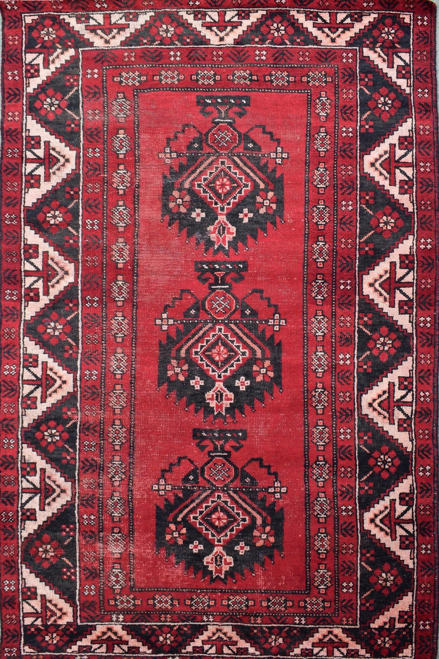 Hand knotted antique Persian Shiraz rug 116x188 cm with traditional red tribal medallion pattern