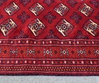 Traditional Shiraz Persian rug border detail with intricate tribal guard stripes and geometric motifs