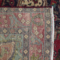Backside of hand knotted Persian Shiraz rug showing weave density and traditional wool foundation