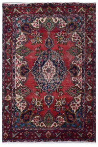 Hand knotted vintage Persian Shiraz rug 133x181 cm full view with red field and navy floral medallion