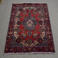 Full length view of Shiraz rug 133x181 cm showing central medallion and detailed ivory corner spandrels