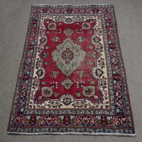 Full length view of Shiraz rug 137x198 cm showing ornate medallion and ivory floral borders