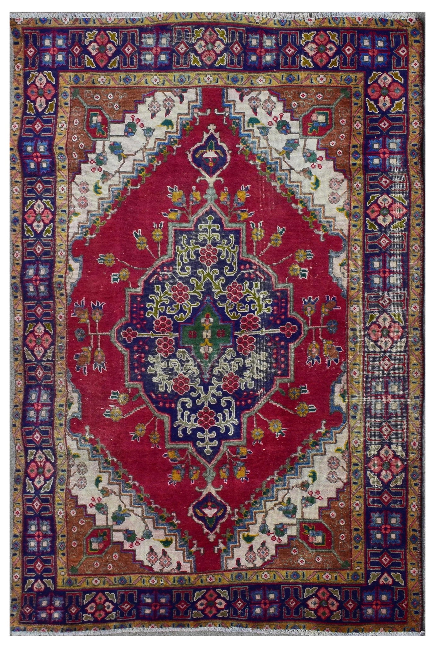 Hand knotted vintage Persian Shiraz rug 133x190 cm full view with red field and navy geometric medallion