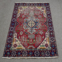 Full length view of Shiraz rug 127x175 cm showing central diamond medallion and ivory corner spandrels