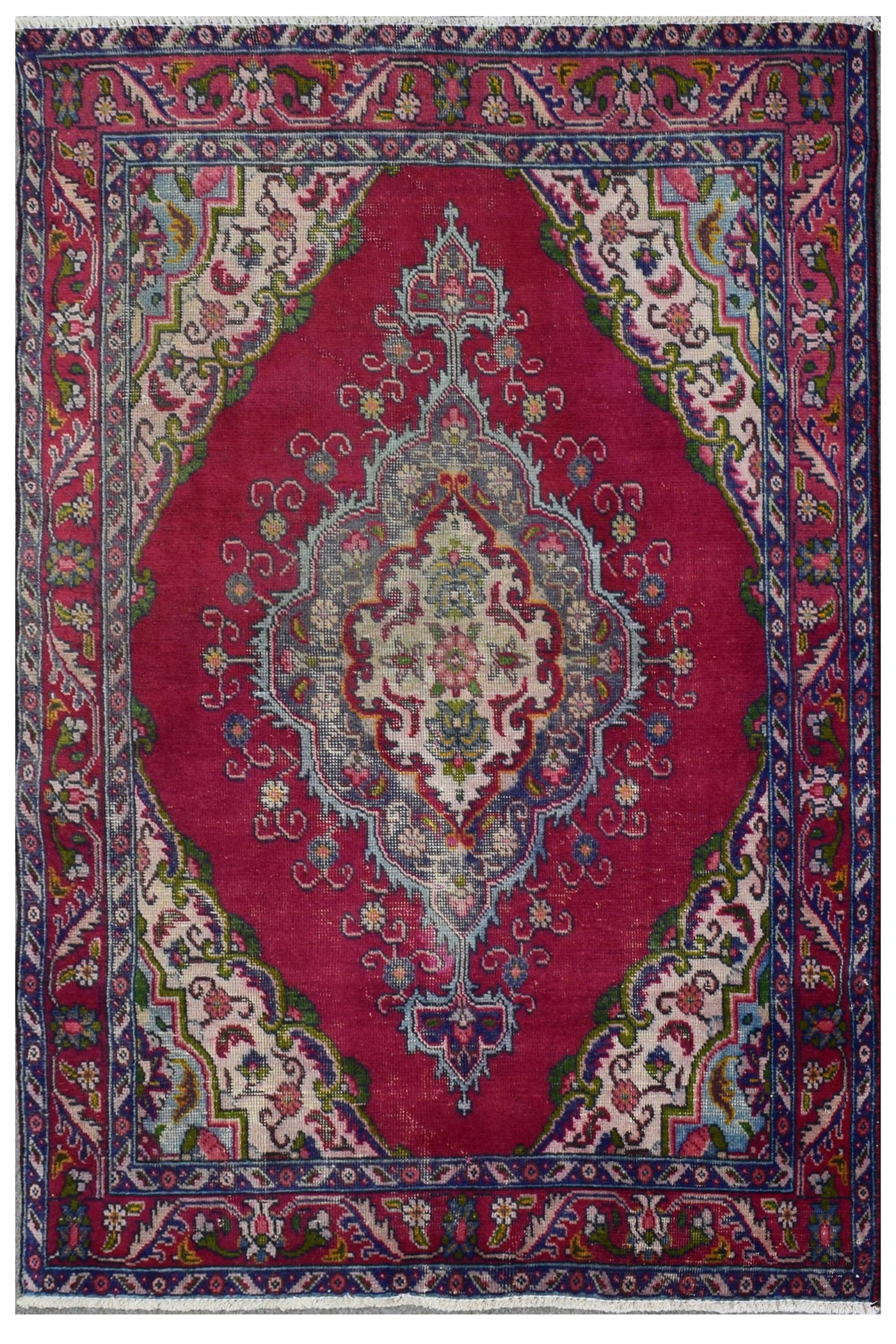 Hand knotted vintage Persian Shiraz rug 137x187 cm full view with deep red field and ornate ivory medallion