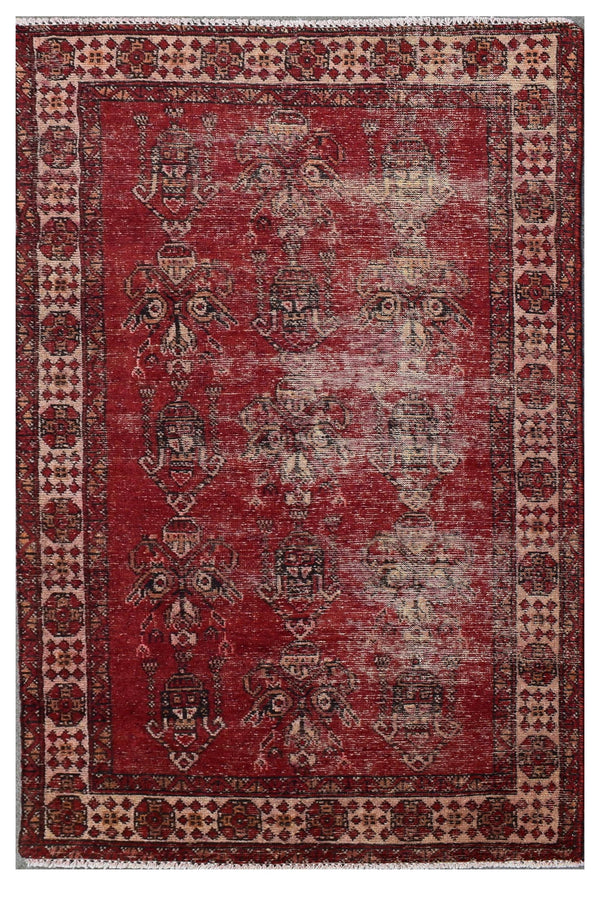 Hand knotted vintage Persian Shiraz rug 118x188 cm full view with distressed red field and faded tribal motifs