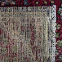 Backside of hand knotted Persian Shiraz rug showing tight weave structure and authentic handmade construction