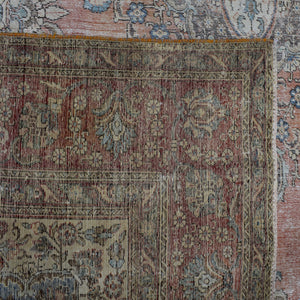 Backside of hand knotted Persian rug showing weave structure and authentic handmade construction
