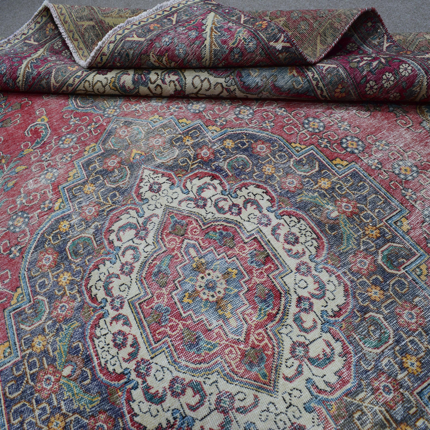 Backside of hand knotted Persian rug showing weave structure and authentic handmade construction
