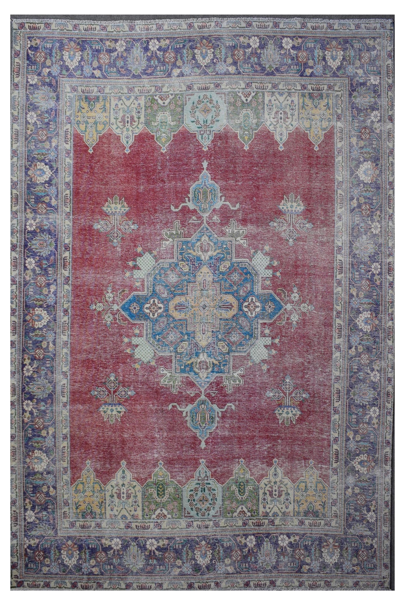 Distressed hand knotted vintage Persian rug 288x375 cm with faded red field and blue central medallion