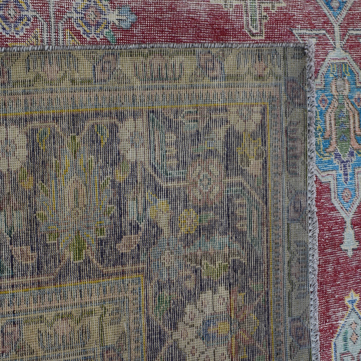 Backside of hand knotted Persian rug showing weave structure and authentic handmade construction