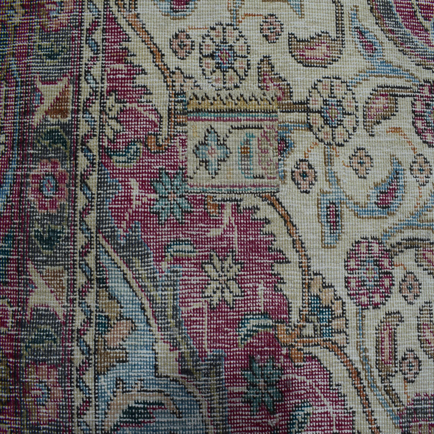 Backside of hand knotted Persian rug showing weave structure and authentic handmade construction