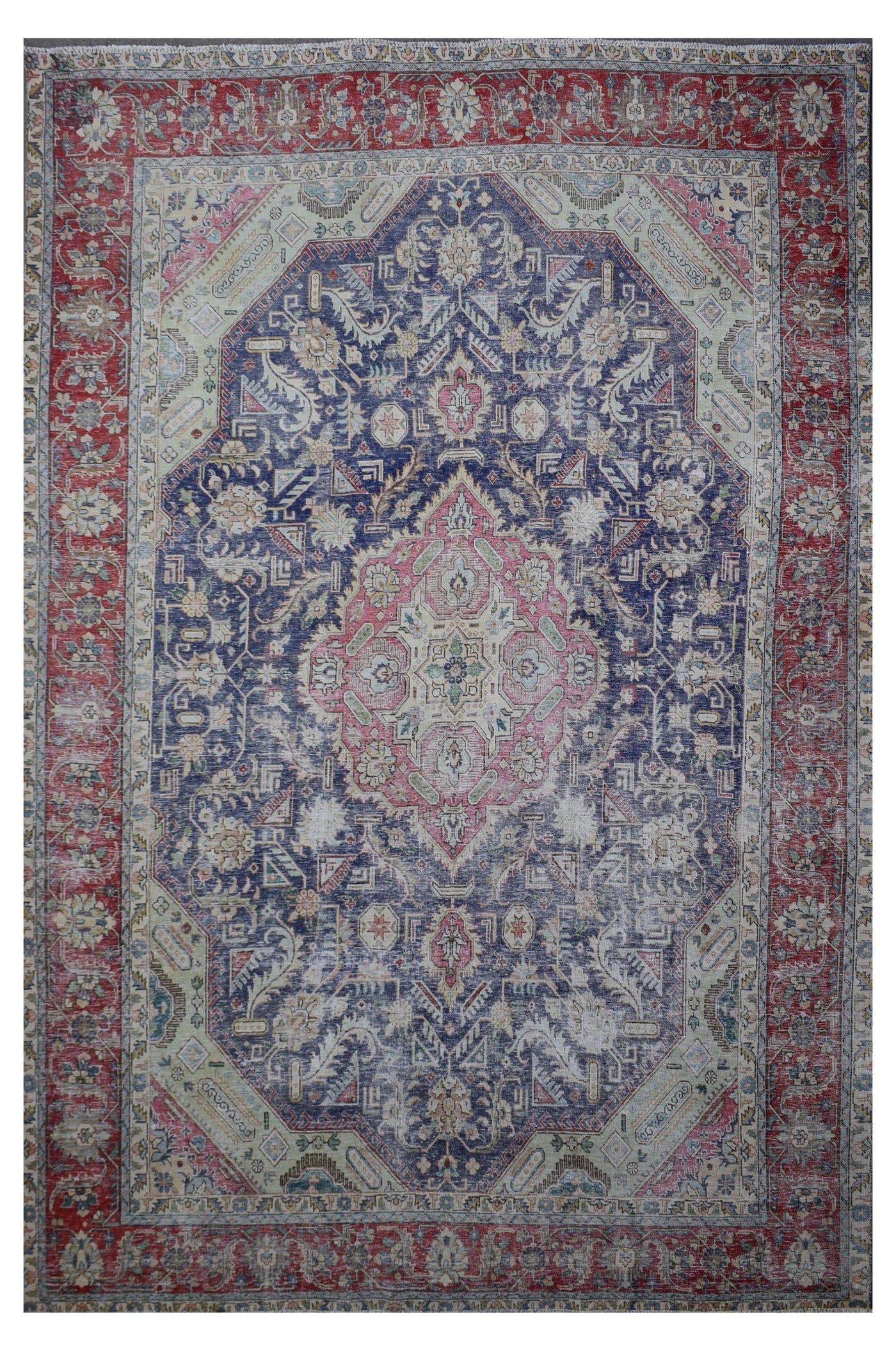 Distressed hand knotted vintage Persian rug 285x383 cm with faded navy field and ornate pink central medallion
