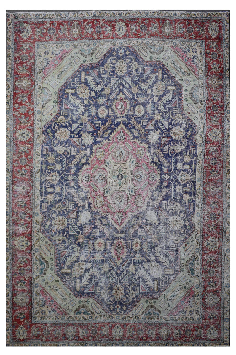 Distressed hand knotted vintage Persian rug 285x383 cm with faded navy field and ornate pink central medallion
