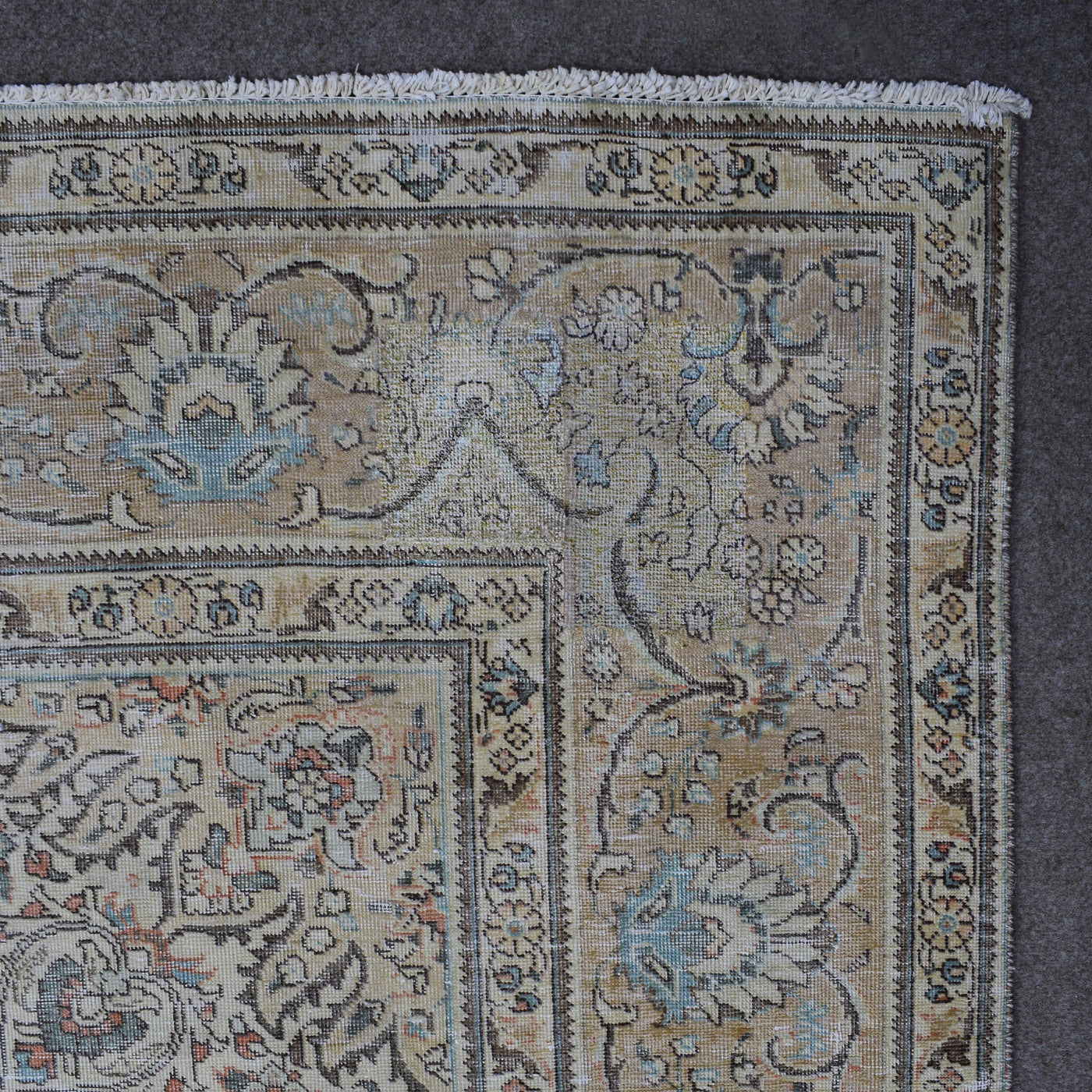 Backside of hand knotted Persian rug showing weave structure and authentic handmade construction
