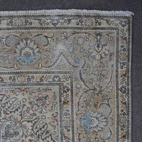 Backside of hand knotted Persian rug showing weave structure and authentic handmade construction