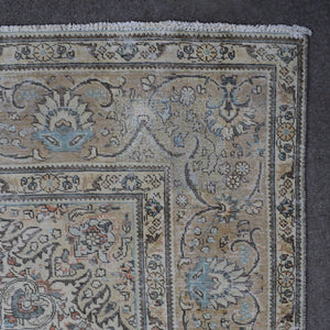 Backside of hand knotted Persian rug showing weave structure and authentic handmade construction