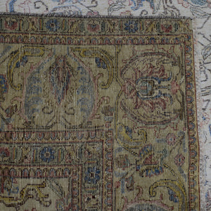 Backside of hand knotted Persian rug showing weave structure and authentic handmade construction