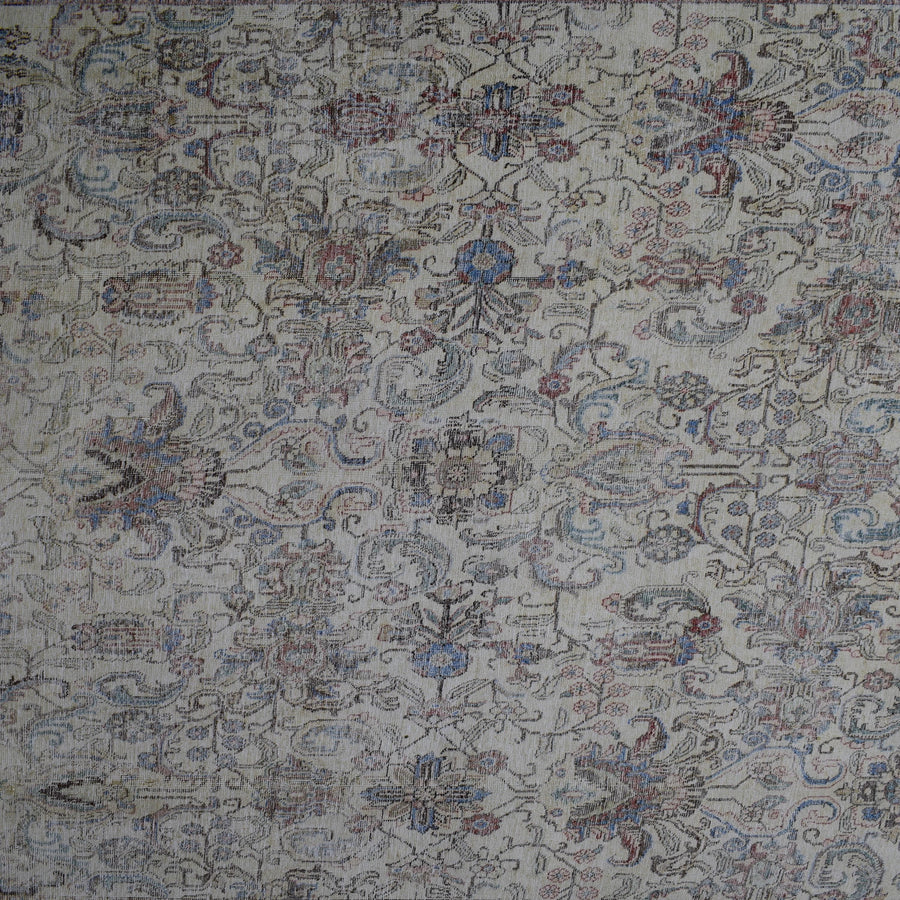 Detailed view of vintage Persian rug pattern featuring traditional Persian floral design in soft blue and beige tones