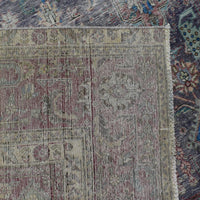 Backside of hand knotted Persian rug showing weave structure and authentic handmade construction