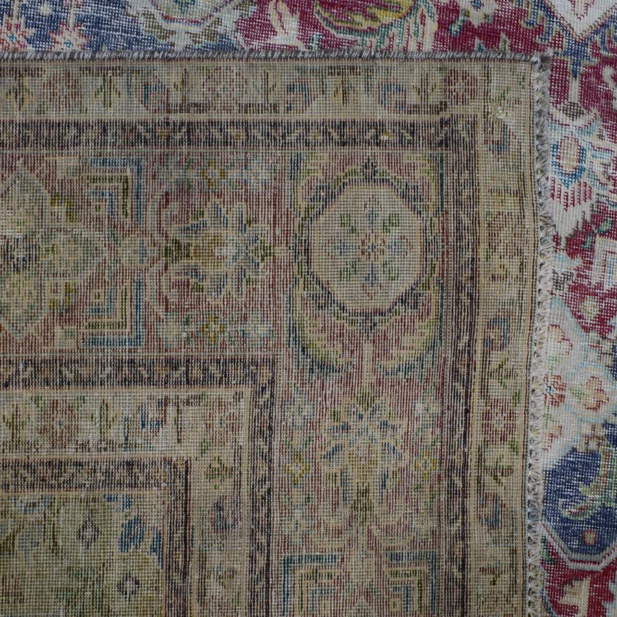 Backside of hand knotted Persian rug showing weave structure and authentic handmade construction