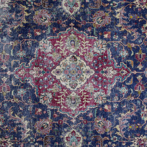 Detailed view of vintage Persian rug medallion featuring traditional Persian floral design on navy field