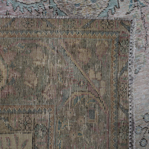 Backside of hand knotted Persian rug showing weave structure and authentic handmade construction