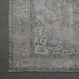 Corner detail of Persian rug with decorative border and traditional Persian motifs