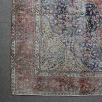 Corner detail of Persian rug with decorative border and traditional Persian motifs